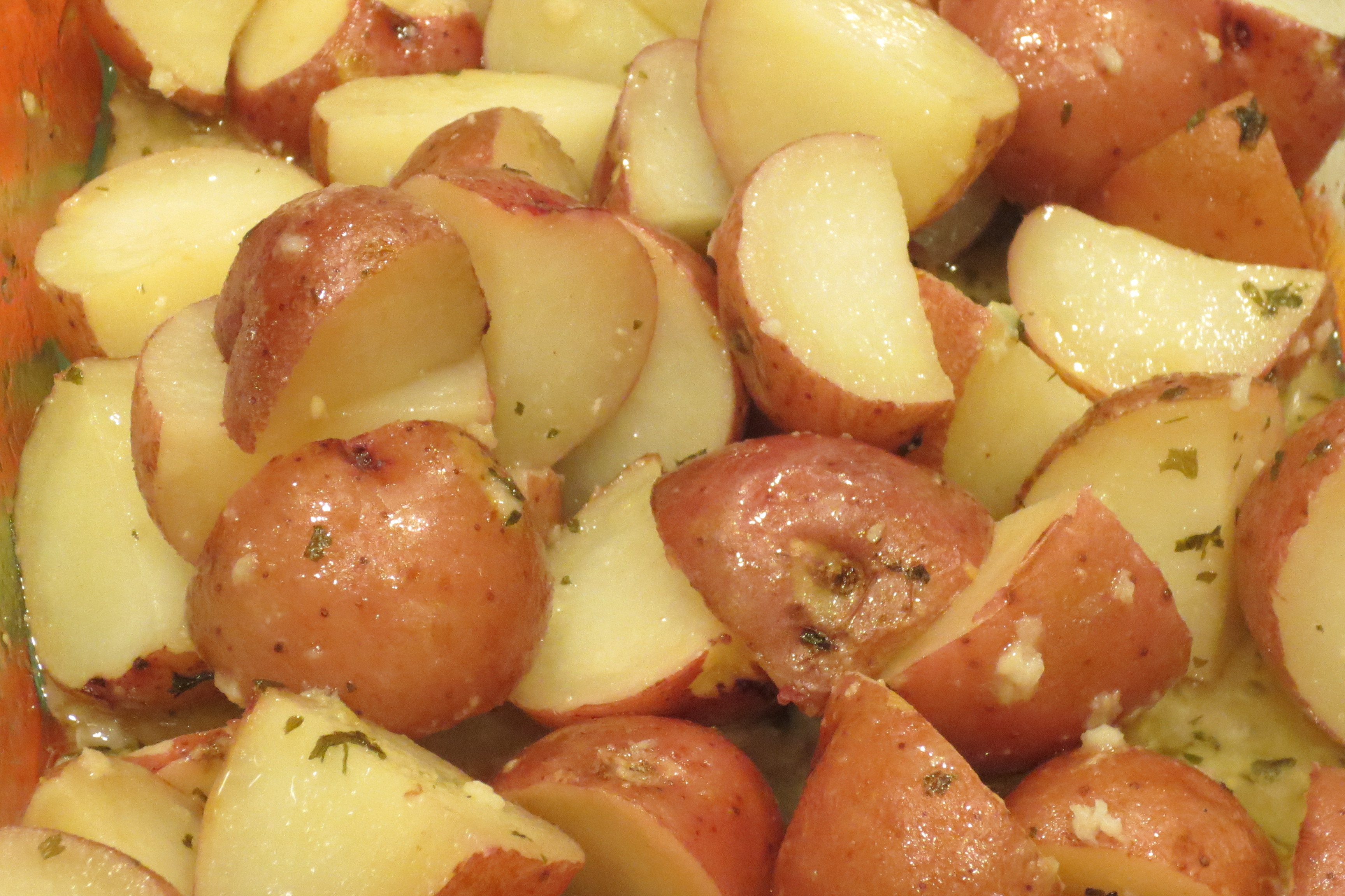 There are potatoes in the bag. Roast Potatoes. Jacket Potatoes. Potatoes with Red and Green Bell Peppers known as Potatoes o'Brien.